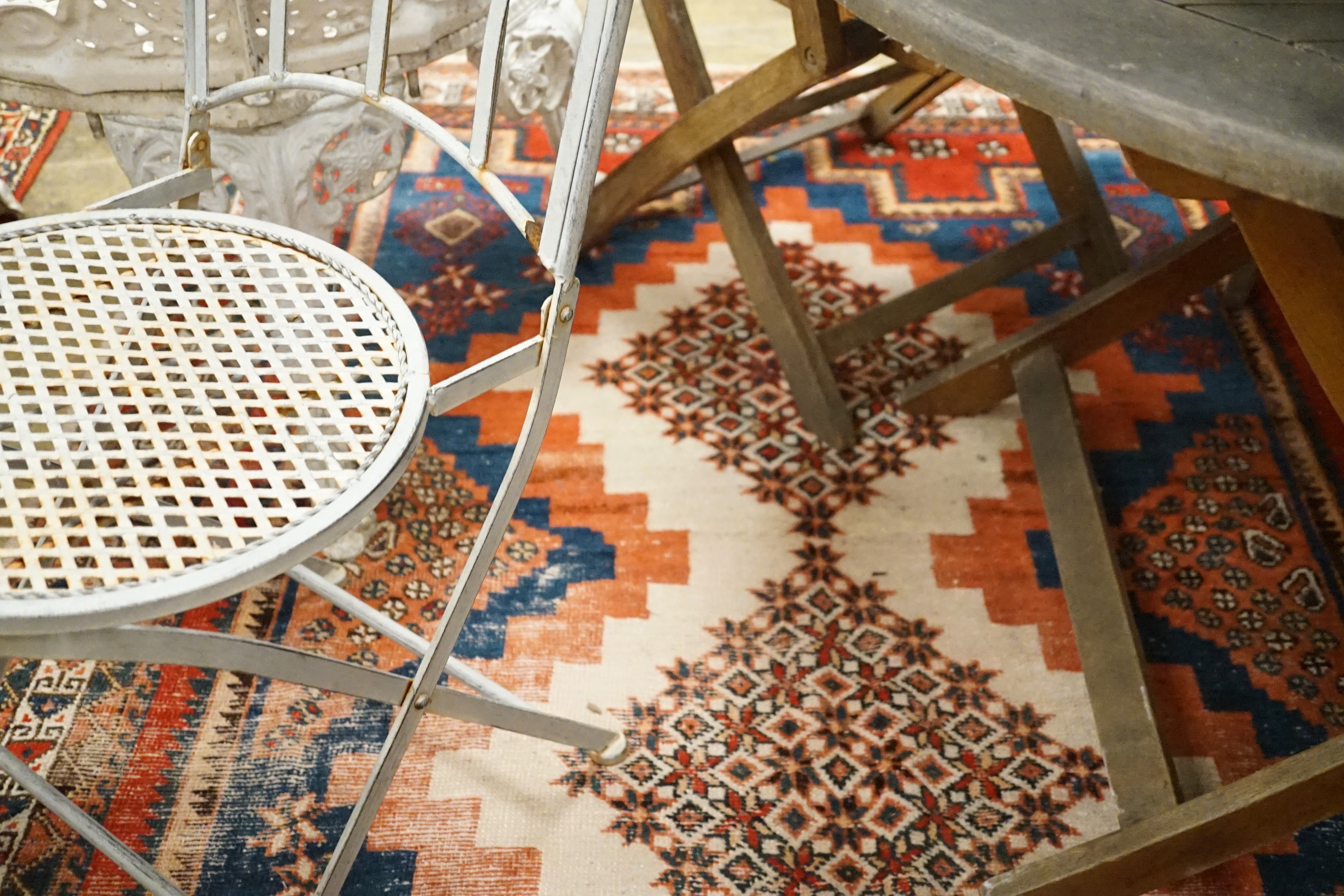 An antique Afshar ivory ground rug, 196 x 142cm